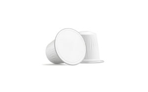Blank white coffee capsule bag mock up, isolated, front view, 3d rendering. Empty bio sealed box mockup for latte and cofe. Clear single-serve pod with caffeine and cream.